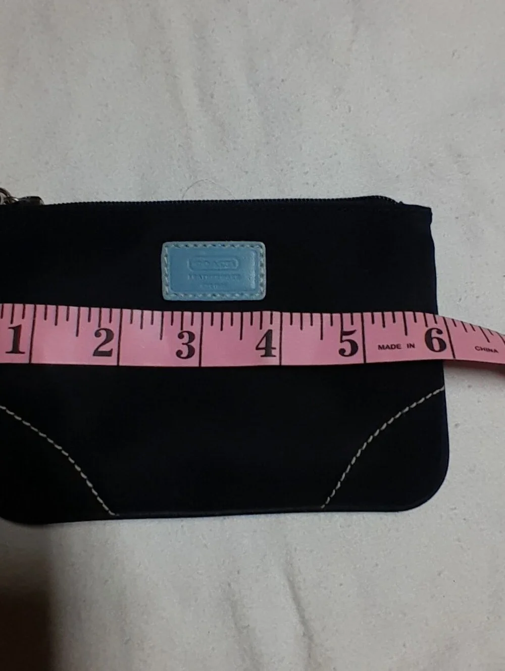 Black Wristlet Clutch with Light Blue Accents